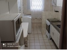 Apartamento Anual de 1/4 rua 701, de frente para rua com garagem e mobiliado.